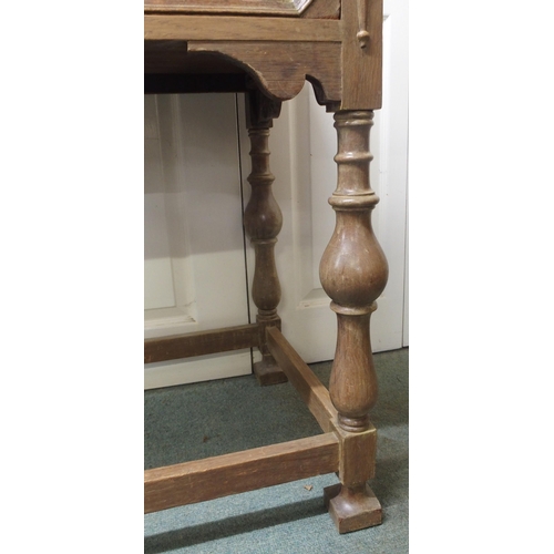 28 - A 20th century honeyed oak two drawer hall table on stretchered turned supports, 78cm high x 104cm w... 