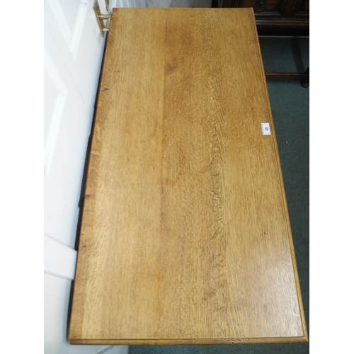 28 - A 20th century honeyed oak two drawer hall table on stretchered turned supports, 78cm high x 104cm w... 