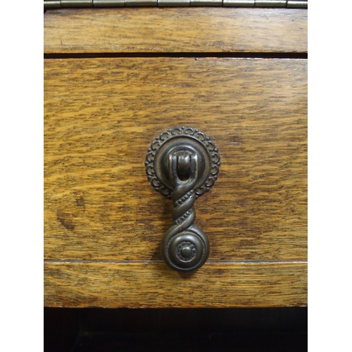 34 - An early 20th century oak writing bureau with fall front writing compartment over single drawer, 109... 