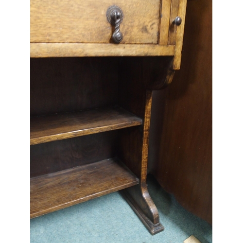 34 - An early 20th century oak writing bureau with fall front writing compartment over single drawer, 109... 