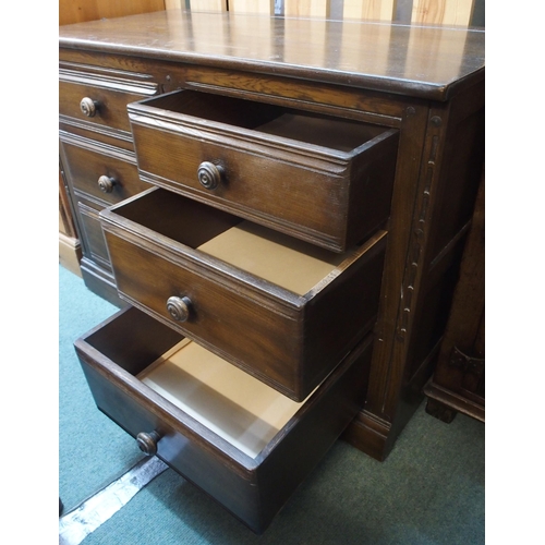 62 - A mid 20th century elm and beech Ercol chest of six drawers, 70cm high x 98cm wide x 49cm deep