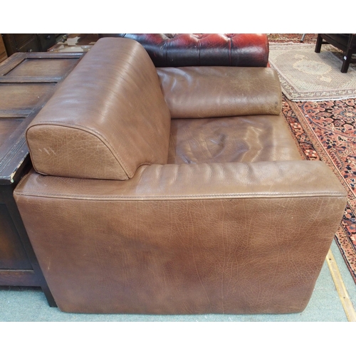 74 - A 20th century brown leather upholstered Walter Knoll armchair, 72cm high x 95cm wide x 85cm deep