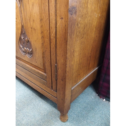 82 - A 20th century oak art nouveau sideboard, 148cm high x 138cm wide x 50cm deep