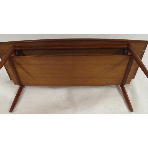 86 - A mid 20th century teak coffee table in the manner of Edvard Kindt Larsen with turned tapering suppo... 