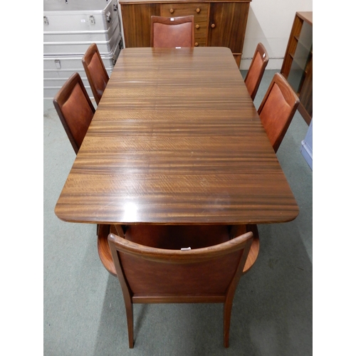 100 - A mid 20th century Afromosia teak extending dining table, 75cm high x 176cm long extended (leaf is 4... 