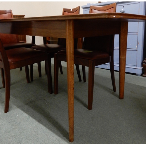 100 - A mid 20th century Afromosia teak extending dining table, 75cm high x 176cm long extended (leaf is 4... 