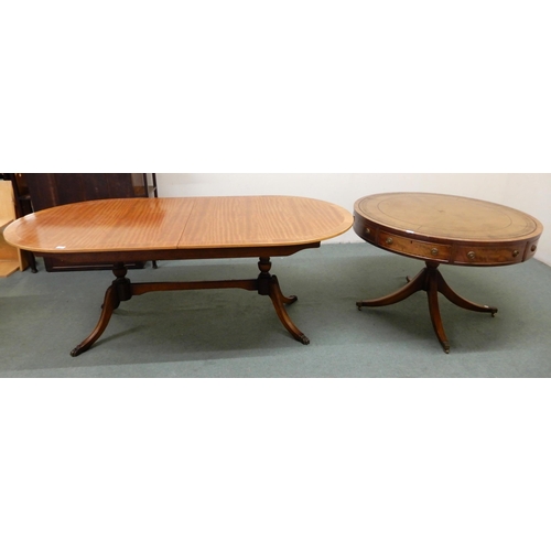 104 - A 20th century mahogany drum table with leather skiver top over four drawers on quadrupedal base, 75... 