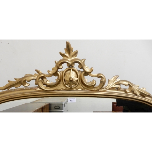 107 - A 19th century gilt gesso framed overmantle mirror with scrolled foliate surmount, 145cm high x 122c... 