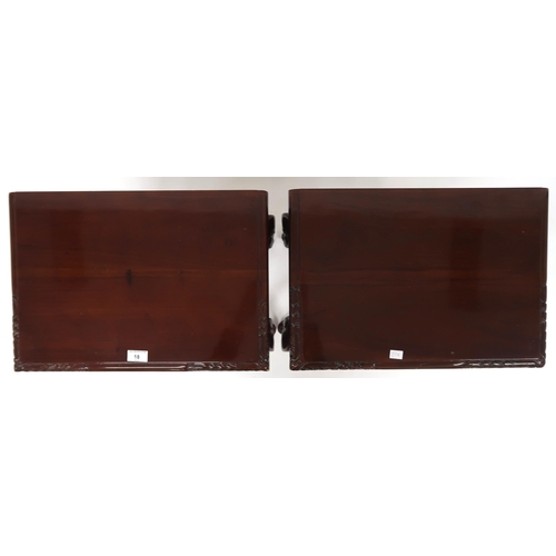 18 - A pair of 20th century mahogany two drawer bedside tables on cabriole supports, 68cm high x 52cm wid...