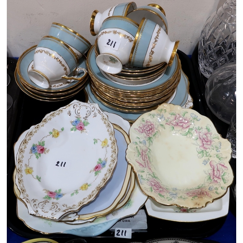 211 - An Aynsley teaset, the yellow ground with black lace decoration, pattern number 3268, together with ... 