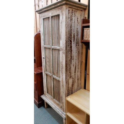 65 - A 20th century continental larder cabinet with destressed finish, 180cm high x 70cm wide x 41cm deep