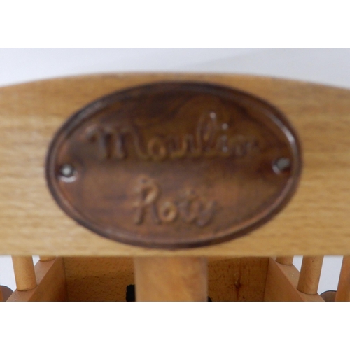 69 - A contemporary Moulin Roty child's pull cart and a contemporary child's rocking chair with carved an... 