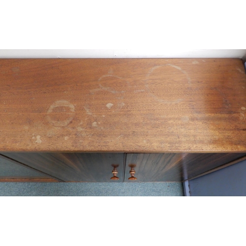 98 - A mid 20th century Afromosia teak bookcase with pair of glazed sliding doors alongside pair of cabin... 