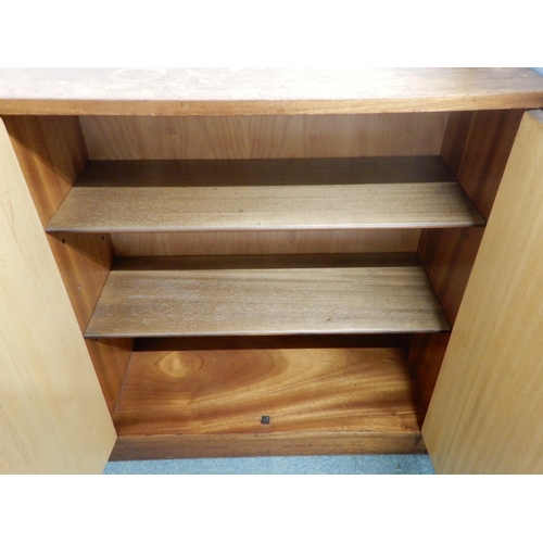 98 - A mid 20th century Afromosia teak bookcase with pair of glazed sliding doors alongside pair of cabin... 