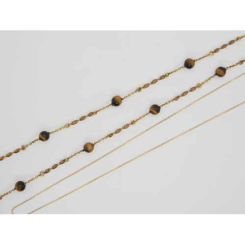 648 - A  9ct gold fancy neck chain strung with tiger's eye beads, by Joseph Cook & Son length 60c...