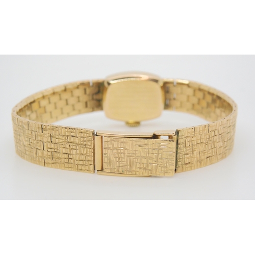 653 - A 9ct gold Jaquet Droz retro wristwatch with all over texture, length 17cm, weight including mechani...