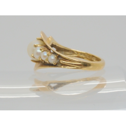 684 - A 14K gold pearl ring, signed Kimberly, largest pearl approx 6.6mm, finger size L, weight 5.5gms