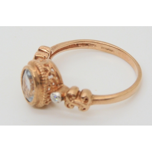 685 - A 9ct rose gold Rocks & Co ring set with an aquamarine and diamond accents, size N1/2, a 9ct gol... 