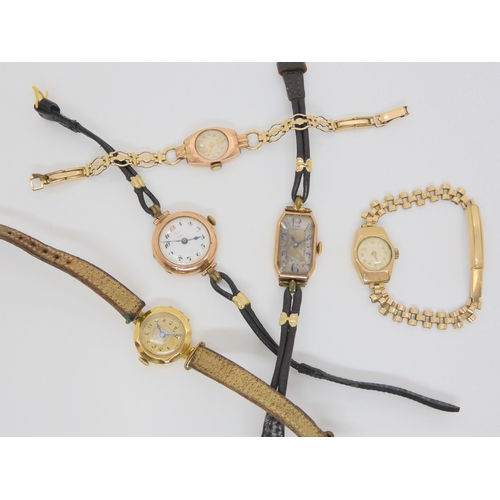 693 - An 18ct gold cased ladies watch, weight including mechanism and strap 12.3gms, and four 9ct gold cas... 