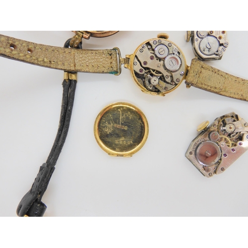 693 - An 18ct gold cased ladies watch, weight including mechanism and strap 12.3gms, and four 9ct gold cas... 