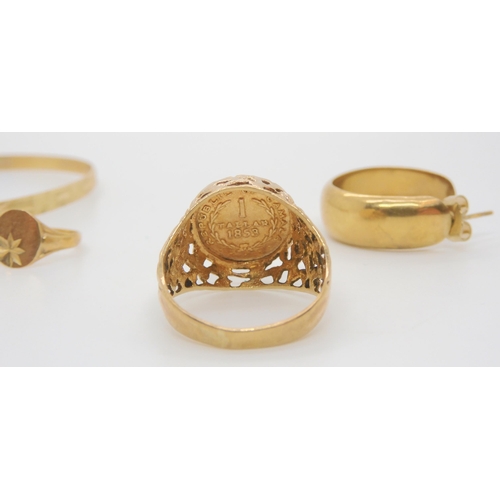 695 - A collection of 9ct items to include a bangle, faux coin ring, size M, a child's signet ring, size G... 