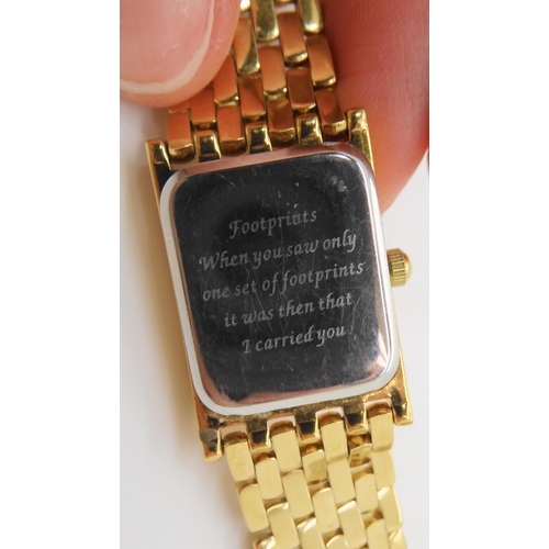 697 - A 9ct gold cased Smiths De Luxe gents watch with a rolled gold strap, weight including strap and mec... 