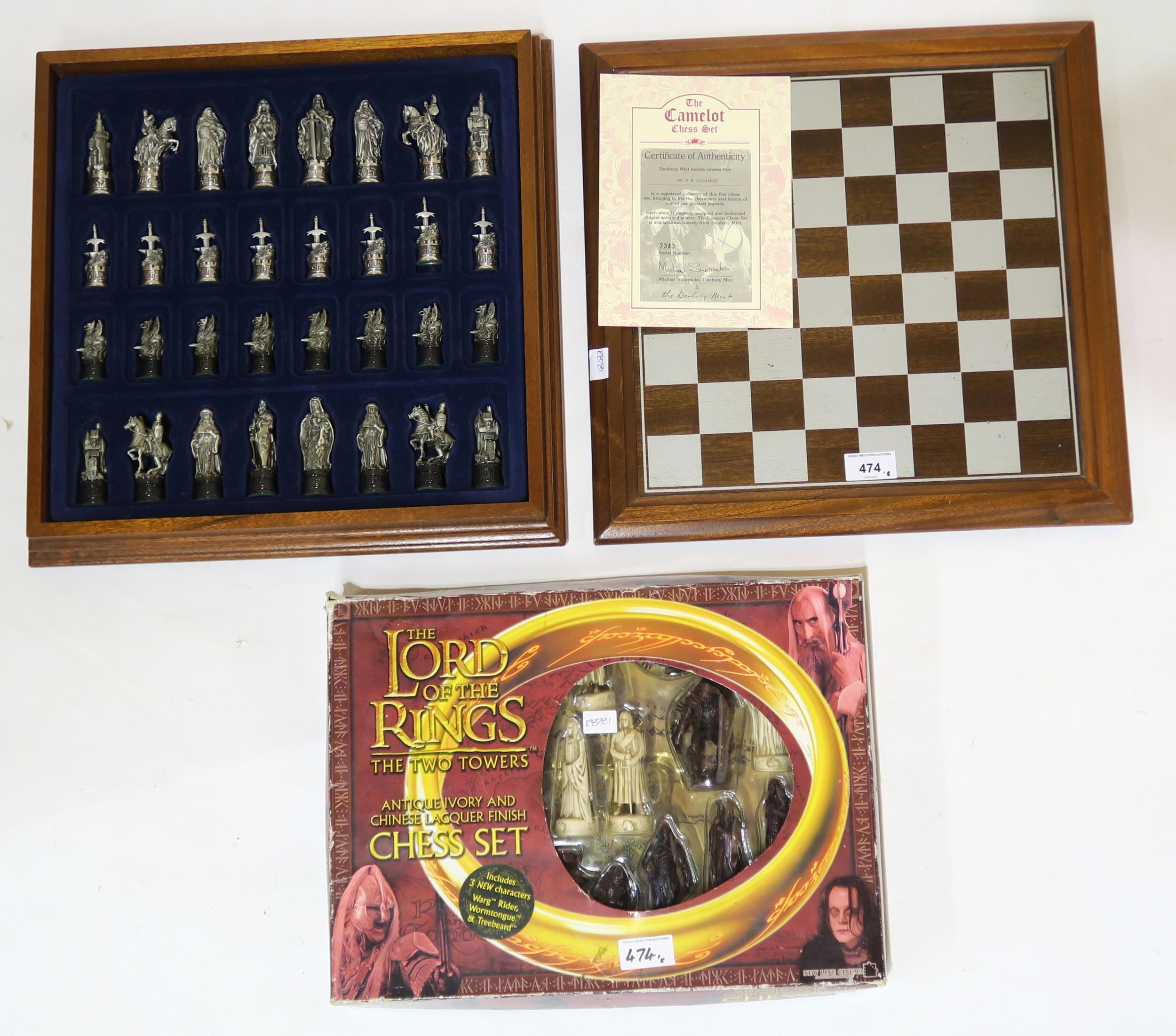 A Danbury Mint Camelot pewter chess set, together with a boxed Lord of the  Rings: the Two Towers c