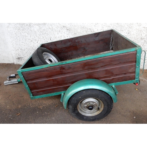 69A - A wood panelled side single axle car trailer with hinged tailgate with mounted lights and spare whee... 