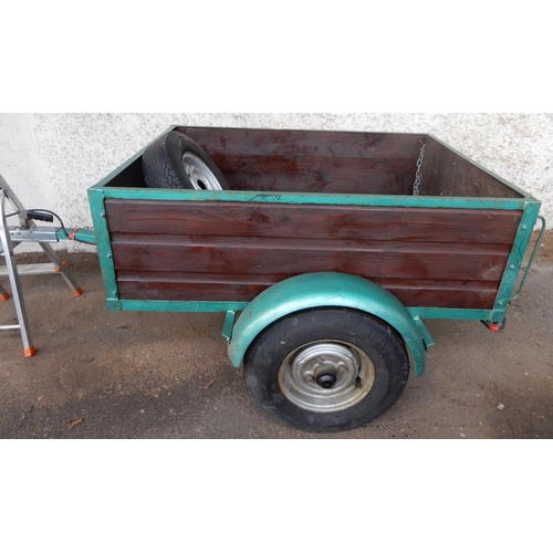 69A - A wood panelled side single axle car trailer with hinged tailgate with mounted lights and spare whee... 