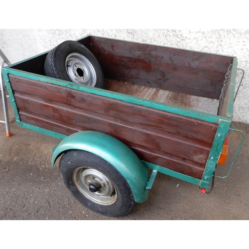 69A - A wood panelled side single axle car trailer with hinged tailgate with mounted lights and spare whee... 