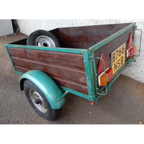 69A - A wood panelled side single axle car trailer with hinged tailgate with mounted lights and spare whee... 