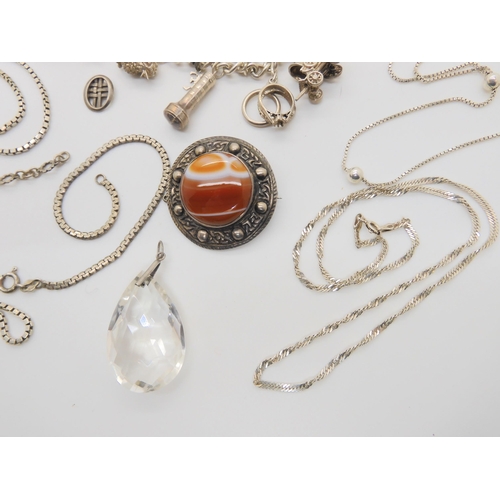 732 - A Robert Allison banded agate brooch, a silver mounted grouse foot brooch, silver charm bracelet and... 