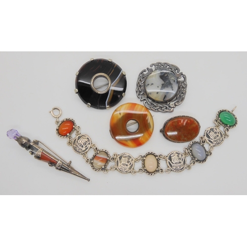 733 - A collection of silver and gemstone jewellery with a Scottish theme, to include a Viking longship  a... 