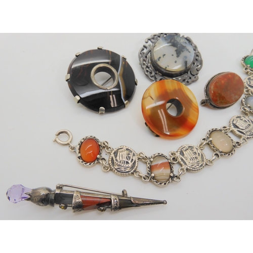 733 - A collection of silver and gemstone jewellery with a Scottish theme, to include a Viking longship  a... 