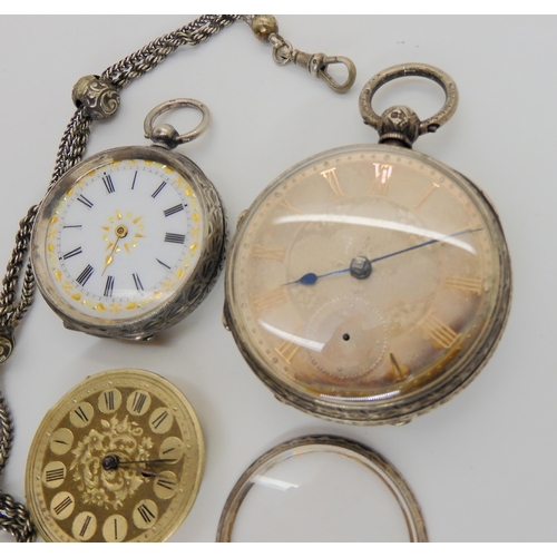 743 - A silver case open pocket watch with hallmarks for 1873, two (af) fob watches and a white metal deco... 