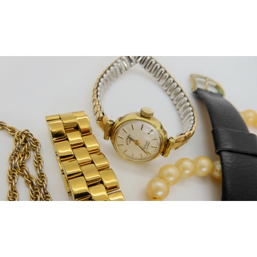 744 - A 9ct gold chain strung with pearls, a 9ct gold gents Rotary watch, a 9ct and silver gem set flower ... 