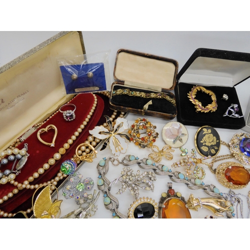 749A - a collection of vintage costume jewellery to include items by Miracle, silver and marcasite items et... 