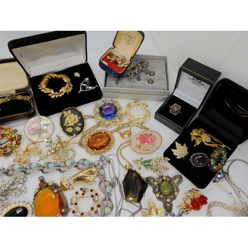 749A - a collection of vintage costume jewellery to include items by Miracle, silver and marcasite items et... 