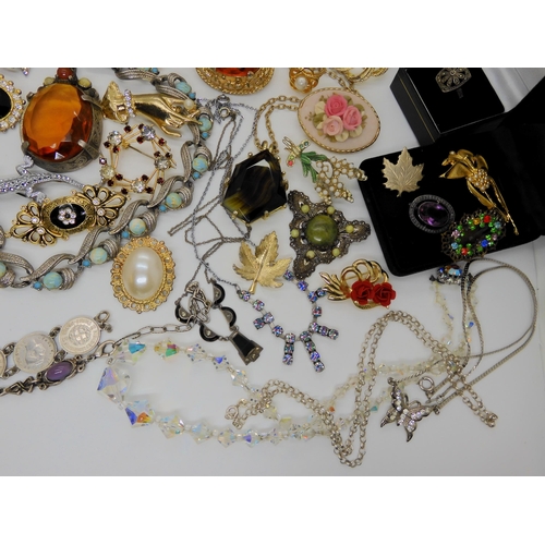 749A - a collection of vintage costume jewellery to include items by Miracle, silver and marcasite items et... 