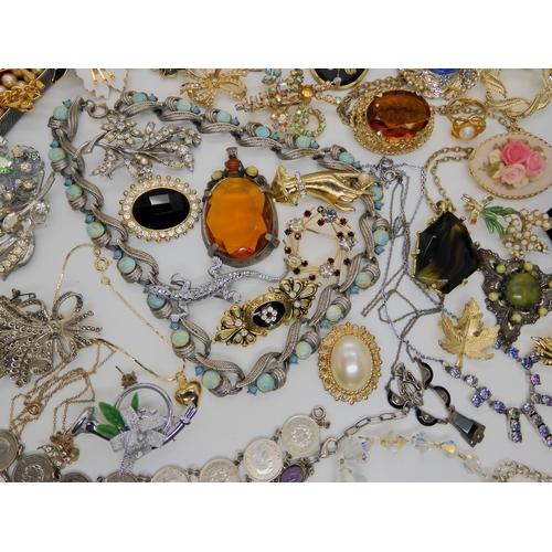 749A - a collection of vintage costume jewellery to include items by Miracle, silver and marcasite items et... 