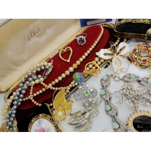 749A - a collection of vintage costume jewellery to include items by Miracle, silver and marcasite items et... 