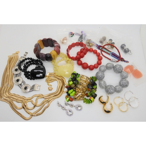 766 - A signed Sobral bracelet, a further unsigned example, a Butler & Wilson multi strand necklace, i... 