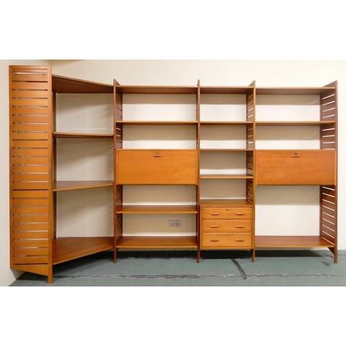 2108 - A MID 20TH CENTURY TEAK STAPLES LADDERAX MODULAR SHELVING SYSTEMcomprising five panel uprights, stee... 