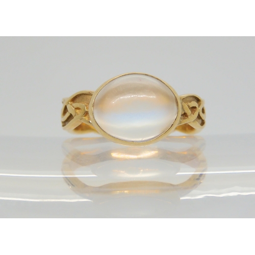 2705 - AN UNUSUAL SHETLAND GOLD MOONSTONE RINGwith 9ct gold Celtic knotwork band, fully hallmarked for Shet... 
