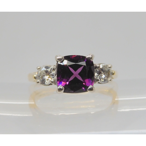 2713 - *WITHDRAWN*AN 18CT GOLD DIAMOND AND RUBELLITE RINGset with estimated approx two 0.25ct brilliant cut... 