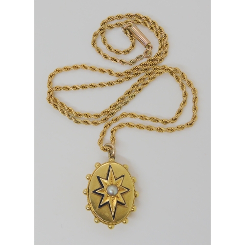 2731 - A VICTORIAN STAR PENDANTset with a central split pearl in an enamelled and cut back bright yellow me... 