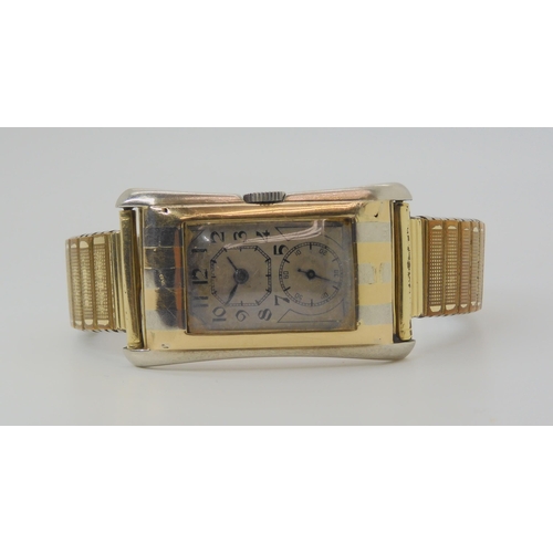 2898 - A VINTAGE ROLEX BRANCARD TIGER STRIPEThe yellow and white gold, striped slightly fluted case is stam... 