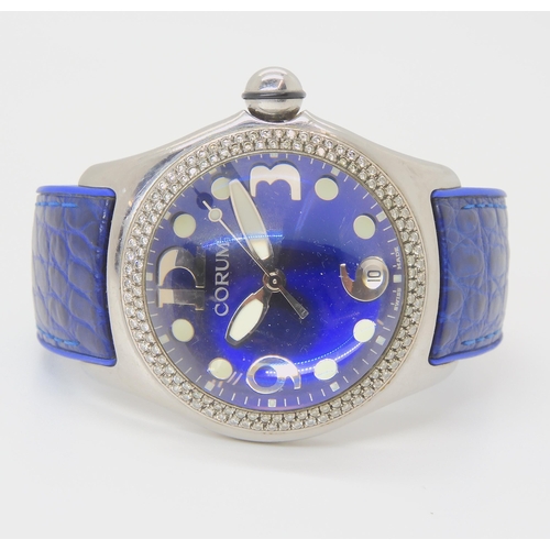 2907 - A CORUM BOUTIQUE WATCHin stainless steel and white gold with a cobalt blue metallic dial, eccentric ... 