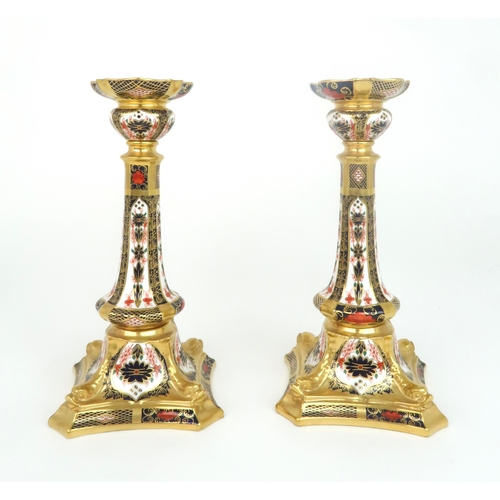 A PAIR OF ROYAL CROWN DERBY CANDLESTICKS