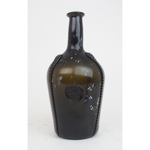 2181 - AN EARLY 19TH CENTURY ALLOA GLASS WINE BOTTLEin dark olive green mottled with white splashes, with f... 